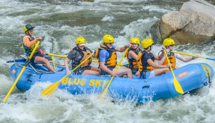 Mardi Half Day Adventure Blue Sky Rafting boat rafts the Colorado River in the Glenwood Canyon