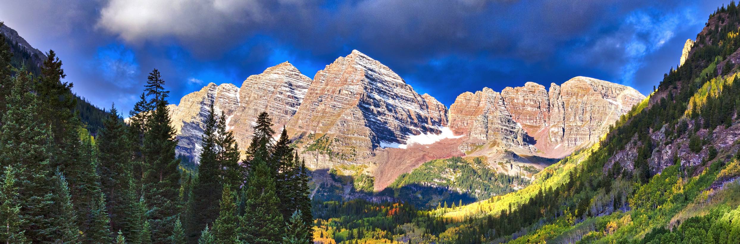 Captured in this image are the Maroon Bells in Aspen, Colorado, showcasing the majestic peaks.